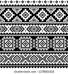 Tribal striped seamless pattern. Aztec geometric black-white background. Can be used in fabric design for clothes, accessories; decorative paper, wrapping, web design, etc. Vector illustration