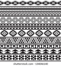 Tribal striped seamless pattern. Geometric black-white background. Swatches of seamless pattern included in the file.