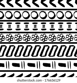 Tribal striped seamless pattern. Geometric hand drawn black-white background. Can be used in fabric design for making of clothes, accessories; decorative paper, wrapping, envelope; web design, etc. 