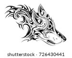 Tribal style wolf head tattoo