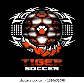 tribal tiger soccer team design with mascot claw holding ball for school, college or league