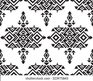 Tribal vector black and white seamless pattern with geometric forms.