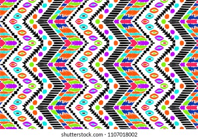 Tribal vector ornament. Seamless African pattern. Ethnic carpet with chevrons. Aztec style. Geometric mosaic on the tile, majolica. Ancient interior. Modern rug. Geo print on textile. Vintage fabric.