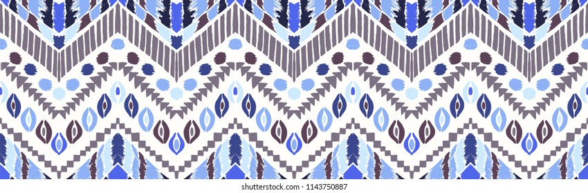 Tribal vector ornament. Seamless African pattern. Ethnic carpet with chevrons. Aztec style. Geometric mosaic on the tile, majolica. Ancient interior. Modern rug. Geo print on textile. Vintage fabric.