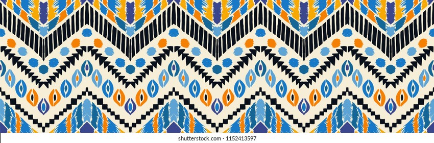 Tribal vector ornament. Seamless African pattern. Ethnic carpet with chevrons. Aztec style. Geometric mosaic on the tile, majolica. Ancient interior. Modern rug. Geo print on textile. Vintage fabric.