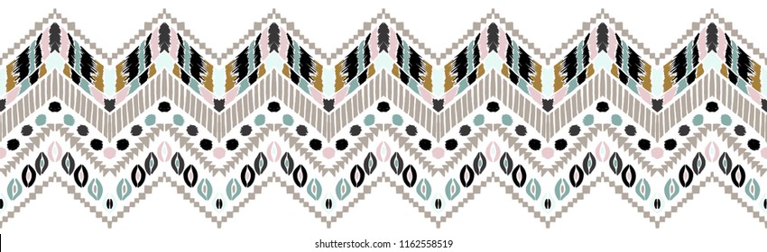 Tribal vector ornament. Seamless African pattern. Ethnic carpet with chevrons. Aztec style. Geometric mosaic on the tile, majolica. Ancient interior. Modern rug. Geo print on textile. Vintage fabric.