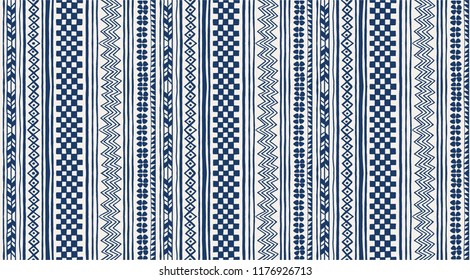Tribal vector ornament. Seamless African pattern. Ethnic carpet with chevrons and strips. Aztec style. Geometric striped pattern. Ancient interior. Modern rug. Geo print on textile. Vintage fabric.  