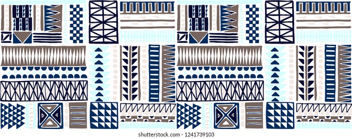 Tribal vector ornament. Seamless African pattern. Ethnic carpet with chevrons. Aztec style. Geometric mosaic on the tile, majolica. Ancient interior. Modern rug. Geo print on textile. Kente Cloth.