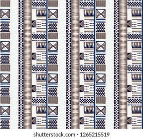 Tribal vector ornament. Seamless African pattern. Ethnic carpet with chevrons. Aztec style. Geometric mosaic on the tile, majolica. Ancient interior. Modern rug. Geo print on textile. Kente Cloth.