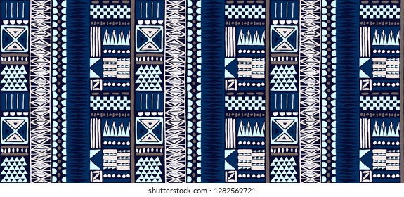 Tribal vector ornament. Seamless African pattern. Ethnic carpet with chevrons. Aztec style. Geometric mosaic on the tile, majolica. Ancient interior. Modern rug. Geo print on textile. Kente Cloth.