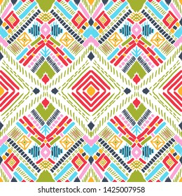 Tribal vector ornament. Seamless African pattern. Ethnic carpet with chevrons. Aztec style. Geometric mosaic on the tile, majolica. Ancient interior. Modern rug. Geo print on textile. Kente Cloth.