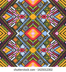 Tribal vector ornament. Seamless African pattern. Ethnic carpet with chevrons. Aztec style. Geometric mosaic on the tile, majolica. Ancient interior. Modern rug. Geo print on textile. Kente Cloth.