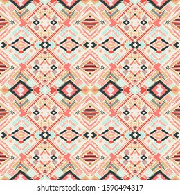 Tribal vector ornament. Seamless African pattern. Ethnic carpet with chevrons. Aztec style. Geometric mosaic on the tile, majolica. Ancient interior. Modern rug. Geo print on textile. Kente Cloth.