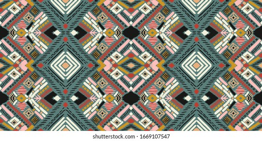 Tribal vector ornament. Seamless African pattern. Ethnic carpet with chevrons. Aztec style. Geometric mosaic on the tile, majolica. Ancient interior. Modern rug. Geo print on textile. Kente Cloth.