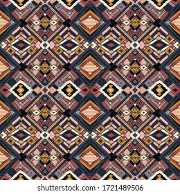Tribal vector ornament. Seamless African pattern. Ethnic carpet with chevrons. Aztec style. Geometric mosaic on the tile, majolica. Ancient interior. Modern rug. Geo print on textile. Kente Cloth.