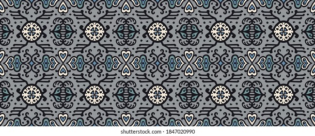 Tribal vector ornament. Seamless African pattern. Ethnic carpet with chevrons. Aztec style. Geometric mosaic on the tile, majolica. Ancient interior. Asian rug. Geo print on textile. Kente Cloth.