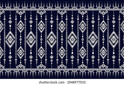 Tribal vector ornament. Seamless African pattern. Ethnic carpet with chevrons. 
Aztec style. Geometric mosaic on the tile, majolica. Ancient interior. 
Modern rug. Geo print on textile. Kente Cloth.