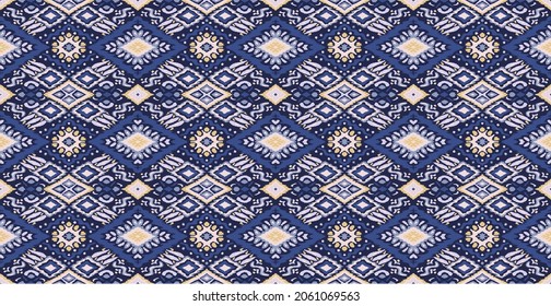 Tribal vector ornament. Seamless African pattern. Ethnic carpet with chevrons. Aztec style. Geometric mosaic on the tile, majolica. Ancient interior. Modern rug. Geo print on textile. Kente Cloth.