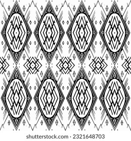 Tribal vector ornament. Seamless African pattern. Ethnic carpet with chevrons. Aztec style. Geometric mosaic on the tile, majolica. Ancient interior. Modern rug. Geo print on textile. Kente Cloth.