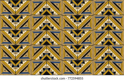 Tribal vector ornament. Seamless African pattern. Ethnic carpet with chevrons and  triangles. Aztec style. Geometric mosaic with triangles on the tile. Ancient interior. Modern rug. Geo print on te