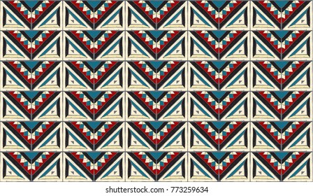 Tribal vector ornament. Seamless African pattern. Ethnic carpet with chevrons and triangles. Aztec style. Geometric mosaic with triangles on the tile. Ancient interior. Modern rug. Geo print