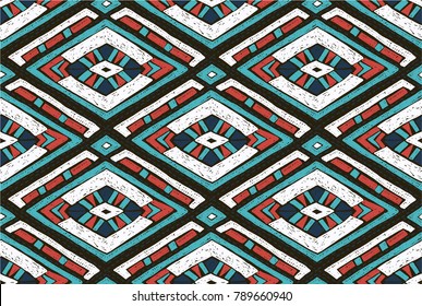 Tribal vector ornament. Seamless African pattern. Ethnic carpet with chevrons. Aztec style. Geometric mosaic on the tile, majolica.  Ancient interior. Modern rug. Geo print on textile. Vintage fabric.