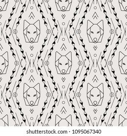Tribal vector pattern. Ethnic seamless texture with geometric ornament and wolf emblem