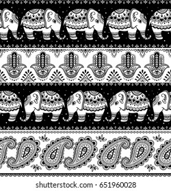 Tribal vector seamless pattern with elephant, paisley and hamsa. Ethnic indian background. Vintage black and white. Hand drawn illustration. Wallpaper, cloth design, fabric, paper, textile, cotton