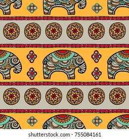 Tribal vector seamless pattern with elephant, paisley and hamsa. Ethnic indian background. Vintage retro color. Hand drawn illustration. Wallpaper, cloth design, fabric, paper, textile, cotton