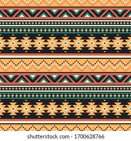 Tribal vector seamless pattern. Ethnic striped ornament. Geometric background with traditional folk motifs. Boho design for textile or paper.