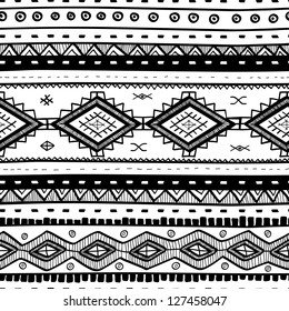 Tribal vector seamless pattern. Hand drawn abstract background. Isolated on white background.