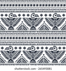 Tribal vector seamless pattern with native American Indian symbols