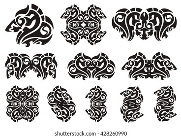 Tribal wavy dragon head symbols. Set of the twirled patterns of the dragon head