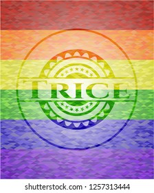 Trice emblem on mosaic background with the colors of the LGBT flag