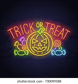 Trick or Treak. Pumpkin and candy neon sign. Happy Halloween. Neon sign, bright signboard, light banner. 