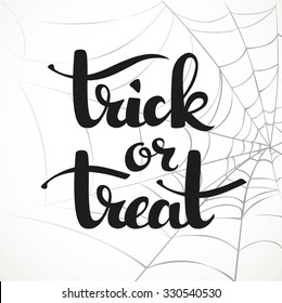 Trick or treat calligraphic inscription on a white background