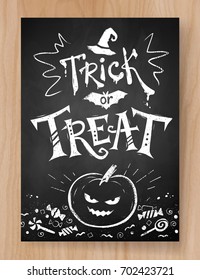 Trick or Treat Halloween postcard chalked design with lettering, pumpkin and candies on wood background.