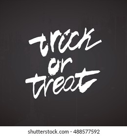 Trick or treat - hand drawn Halloween celebration quote. Handwritten lettering with rough edges. Vector illustration.