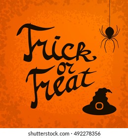 Trick or treat. Hand drawn Halloween lettering. Text banner for Happy Halloween greeting card. Vector design elements.