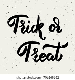 Trick or treat. Hand drawn lettering phrase isolated on white background. Design element for poster, greeting card. Vector illustration