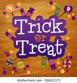 Trick or Treat Happy Halloween Greeting Card Gold Foil Background. Halloween trick or treat candies.