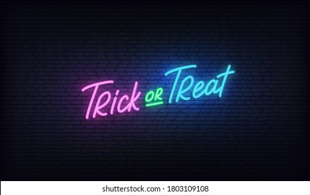 Trick or Treat lettering neon sign. Halloween holiday vector design