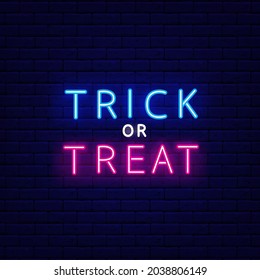 Trick or Treat neon inscription. Happy Halloween banner. Night bright signboard. Outer glowing effect banner for bar and club. Editable stroke. Isolated vector stock illustration