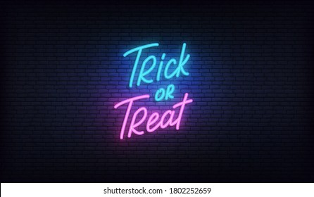 Trick or Treat neon lettering sign. Halloween holiday vector design
