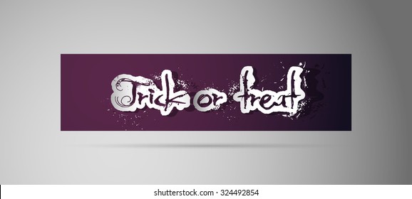 Trick or treat paper cut text message with shadow on dark purple background