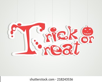 Trick or Treat party celebration with pink text, pumpkin on grey background for Happy Halloween celebrations. 