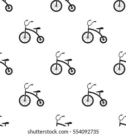 Tricycle icon in black style isolated on white background. Play garden pattern stock vector illustration.