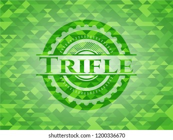 Trifle green emblem. Mosaic background