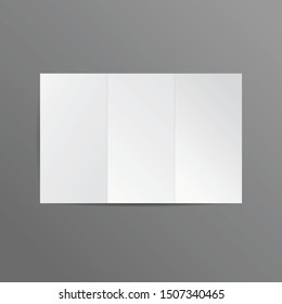 Trifold white paper on grey background