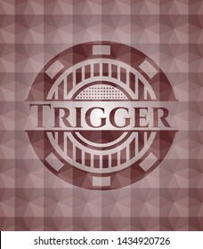 Trigger red emblem or badge with abstract geometric polygonal pattern background. Seamless.